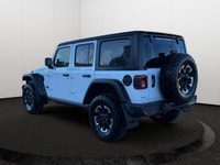 This 2025 JEEP WRANGLER 4-DOOR RUBICON has the following options Cloth Low-Back Bucket Seats, Remote... (image 3)