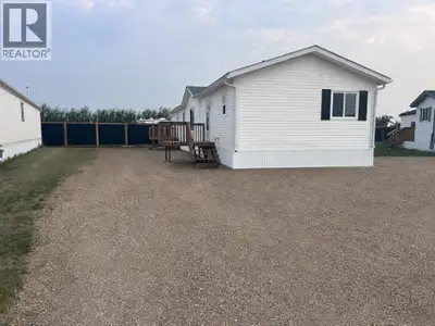 IMMEDIATE POSSESSION! This home is located on a pie shaped lot in poplar point! You will appreciate...