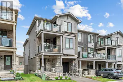 Welcome to Unit 82 at 10 Birmingham Dr! This modern 3-storey Branthaven-built end-unit townhouse fea...