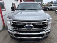 This outstanding example of a 2023 Ford Super Duty F-350 SRW XLT is offered by Stampede Auto. Sophis... (image 1)