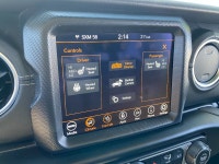 Discover the 2021 Jeep Wrangler Unlimited Sahara in striking Gecko Pearl – a rugged 4x4 built for ad... (image 7)