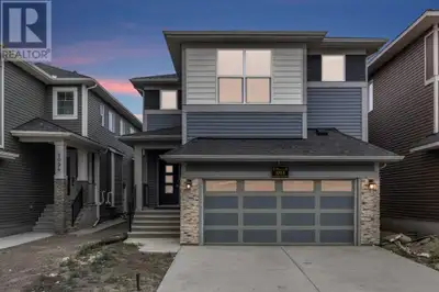 Located in the sought-after community of Midtown in Airdrie, this stunning SHANE HOME BUILT, home of...