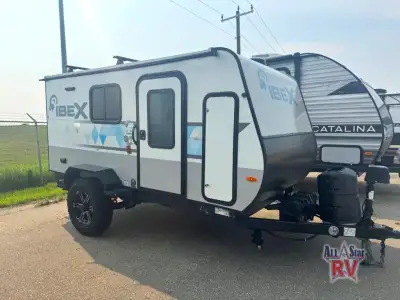 Forest River IBEX travel trailer 10LHRK highlights: Dual Wardrobes Exterior Kitchen Sleeps Two JBL W...