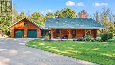 Discover this beautiful log cabin home set on 6 private wooded acres, just 10 minutes from Walkerton...