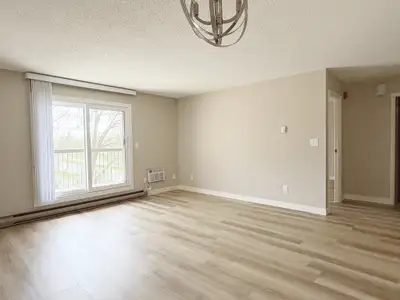 Newly renovated suite featuring brand-new appliances and convenient in-suite laundry. A fresh, moder...