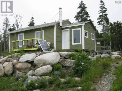 1.7 acres land with a cottage and 2 sheds , it is about 45 minutes drive from Dartmouth, and , Main...