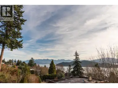 View home with income suite on sought after Abbs Road in Gibsons! Step into the bright living area w...