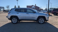 The 2026 Jeep Compass Sport is a compact SUV that blends style, capability, and modern technology. F... (image 7)