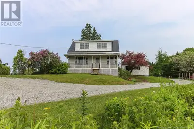 A charming 1.5-story home that beautifully blends rustic appeal with modern potential. Set on nearly...