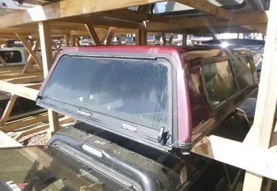 Chevrolet Sierra 1999 - 2006 Chevrolet Silverado or GMC Sierra 6'6 Burgandy Hawk Truck Cap This unit...