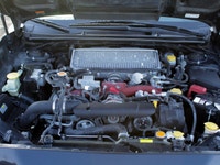 Feel the thrill of the road with the 2017 Subaru WRX STI Sport, finished in a striking shade of gray... (image 8)