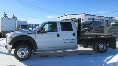 CHECK OUT THIS NEW 2013 FORD F-450 LOW KM'S TRUCK.... 2013 Ford F-450 Super Crew Cab FLATDECK - 4x4...