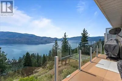 Perched on the hillside in picturesque Peachland, this beautifully updated 2-bedroom, 2-bathroom tow...