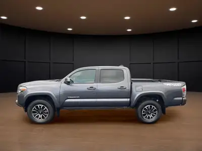 The 2023 Toyota Tacoma TRD Sport V6 in stunning gray is ready to tackle any terrain with its robust...