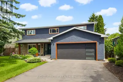 Nestled on a quiet, family-friendly circle, this exceptional residence has been extensively remodell...
