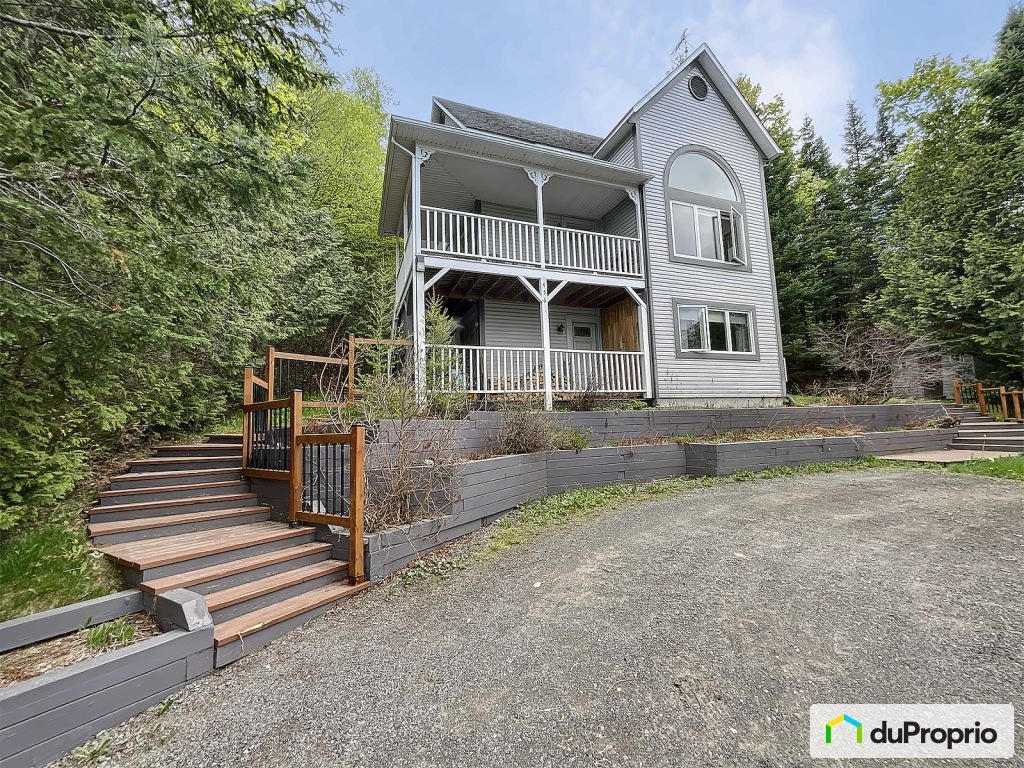 $587,900 - 3 Storey for sale in Ste-Adele — photo 1