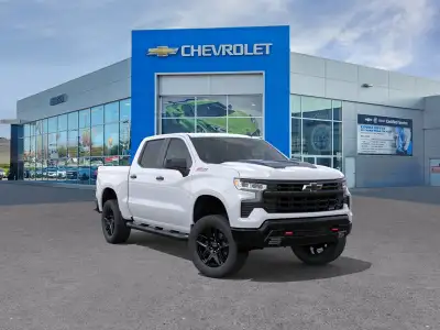 Experience the 2026 Chevrolet Silverado 1500 LT Trail Boss in Summit White – a rugged and refined Cr...
