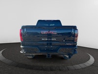 Welcome to Capital GMC! This 2026 GMC Sierra 3500HD AT4 Capital Custom Lift Truck in Onyx Black is e... (image 3)