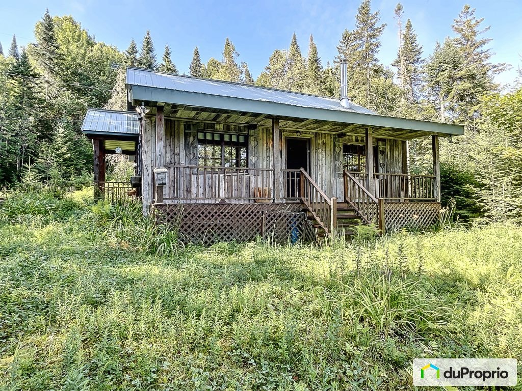 $459,900 - Cottage for sale in Val-Des-Lacs — photo 1