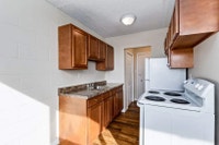 Amenities: Fireplace • Security Lights • Heat & Water Included Suite & Building: Spacious bachelor,... (image 3)