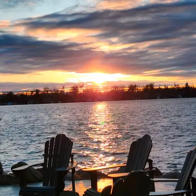 Sunsets on Balsam Lake. Newly built lake house with 180 degrees of waterfront. This beautiful point...