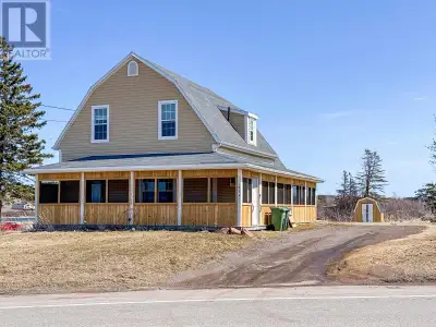 Perched above the shimmering waters of St. Peters Bay, 1933 Cardigan Road offers a rare blend of coa...