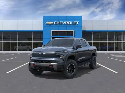 Built to conquer, the 2026 Silverado EV Trail Boss Max Range Crew Cab 4X4 in Blue Smoke Metallic bri...