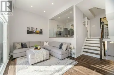 his Newly Renovated Open Concept Executive Townhome With Exceptional Finishes, This 3 bedroom 3 bath...