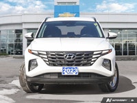 The 2023 Hyundai Tucson Preferred, featuring a brilliant Crystal White exterior complemented by a re... (image 1)
