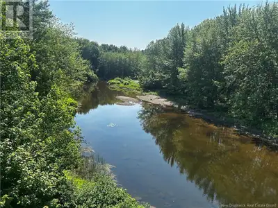 This property is (+/-) 0.95 acres and borders Jones Creek which flows into the Saint John River. The...