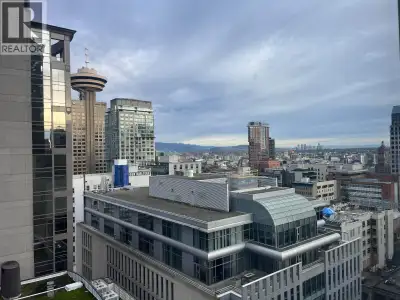 PERFECT MATCH for SERIOUS INVESTORS! NE exposure 1-bed + den at The Hudson in the prime Vancouver do...