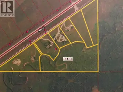 9+ acres of land is immediately east of Waterton Lakes National Park. This unique property incorpora...