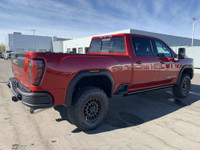 AMVIC Licensed Dealer The 2026 GMC Sierra HD AT4X AEV Edition in Volcanic Red Tintcoat is engineered... (image 8)