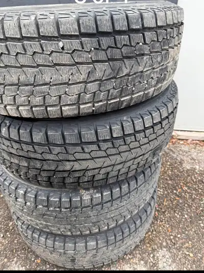 (4) 225 65 17 Yokohama Snow Tires mounted on steel rims from a Dodge Caravan. Dot 2719 + 75 percent...