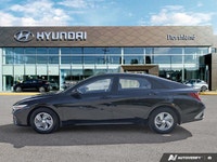 This 2024 Hyundai Elantra Essential shines with its sleek Abyss Black exterior and practical feature... (image 1)