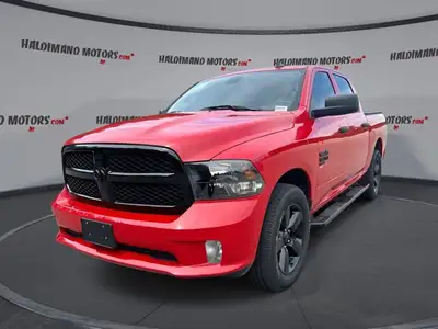 // ACCIDENT FREE!! // Finished in red with a grey interior, this 2023 RAM 1500 Classic Express Crew...