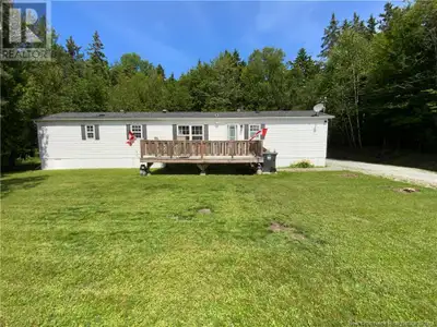 Located just outside the town of Hampton, NB, this beautifully updated mini home offers an inviting...