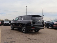 This Chevrolet Suburban boasts a Gas V8 5.3L/ engine powering this Automatic transmission. ENGINE, 5... (image 4)