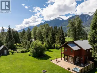 Located in coveted Pemberton Meadows, this exceptional flat 1-acre property features a beautifully r...