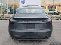 This Tesla Model 3 delivers a Electric engine powering this Automatic transmission. Window Grid Ante... (image 3)