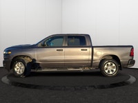 This Ram 1500 has a strong Regular Unleaded V-6 3.6 L/220 engine powering this Automatic transmissio... (image 1)