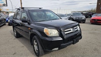 Take on Alberta roads with confidence in this well-equipped 2006 Honda Pilot EX-L! Known for its leg... (image 9)