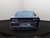 This Dodge Charger has a dependable EFH 3.0L Twin Turbo SIXPACK SO ESS engine powering this Automati... (image 4)