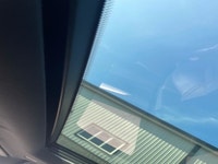 The 2022 BMW X2 xDrive28i Sports Activity Coupe in a sophisticated black finish and equipped with BM... (image 9)