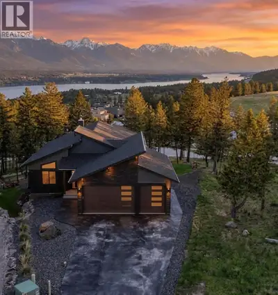 Pineridge Contemporary Lake & Mountain View Home Step into an immediate WOW factor from the floor-to...