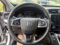 A practical compact SUV with a spacious interior, efficient performance, and modern safety features,... (image 9)