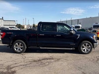 Command the road and conquer your workday with this striking black 2022 Ford F-150 LARIAT, featuring... (image 2)