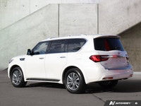 2023 Infiniti QX80 AWD LUXE One Owner, No Accidents. AWD, Pearl White over a Black Leather Interior.... (image 2)