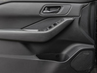 The 2023 Nissan Rogue AWD S in a sleek black hue complements its AWD capabilities, delivering a smoo... (image 6)