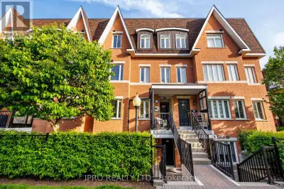 European-Style Living! Spotless & Charming 2+Den Townhome Facing A Cozy Residential Park In Prestigi...